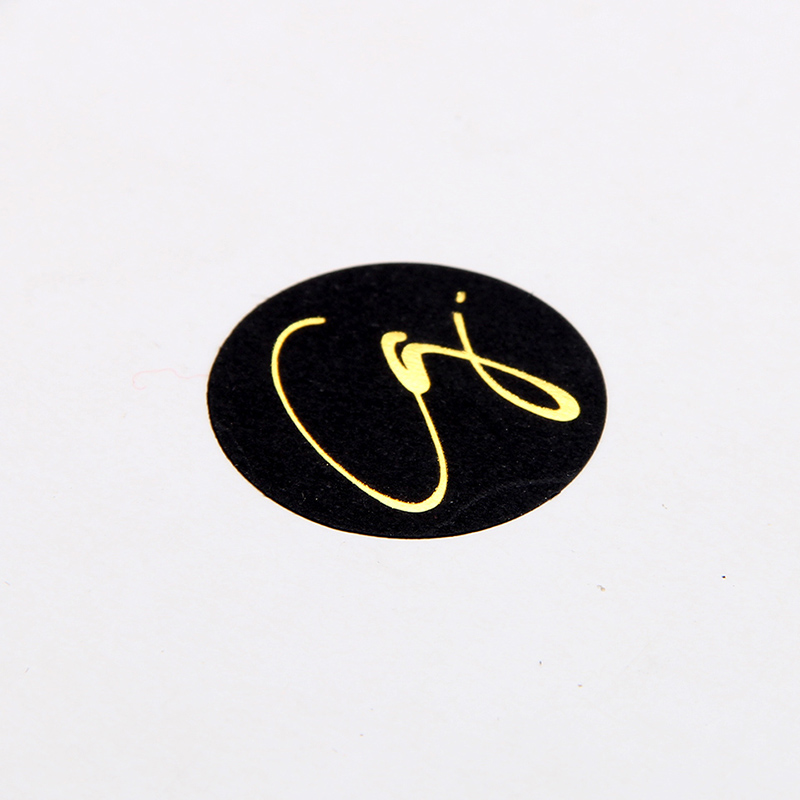 Autocollant rond en papier noir avec logo personnalisé pour emballage de commerce électronique de cosmétiques